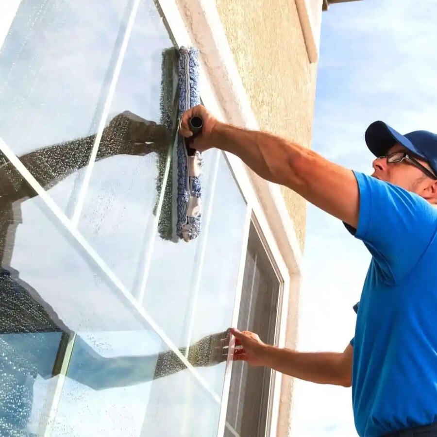 Professional window cleaning scrub step - Calgary residential service